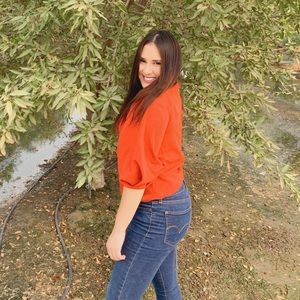 Green Envelope Los Angeles top.